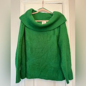 Very cute and stylish green off the shoulder sweater